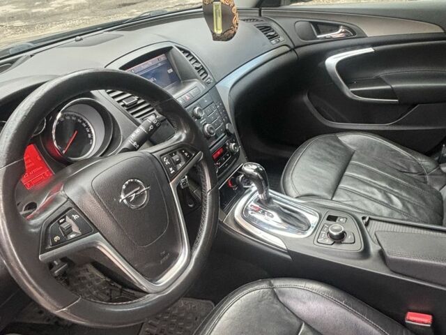 Чорний Опель Інсігнія, об'ємом двигуна 2 л та пробігом 333 тис. км за 10150 $, фото 5 на Automoto.ua