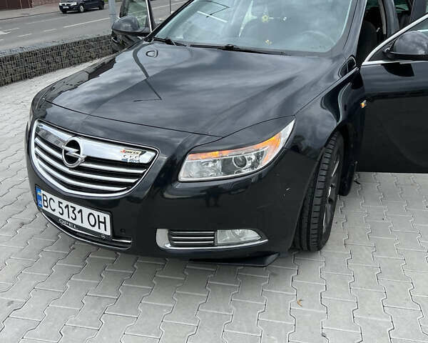 Черный Опель Инсигния, объемом двигателя 1.96 л и пробегом 230 тыс. км за 8500 $, фото 5 на Automoto.ua