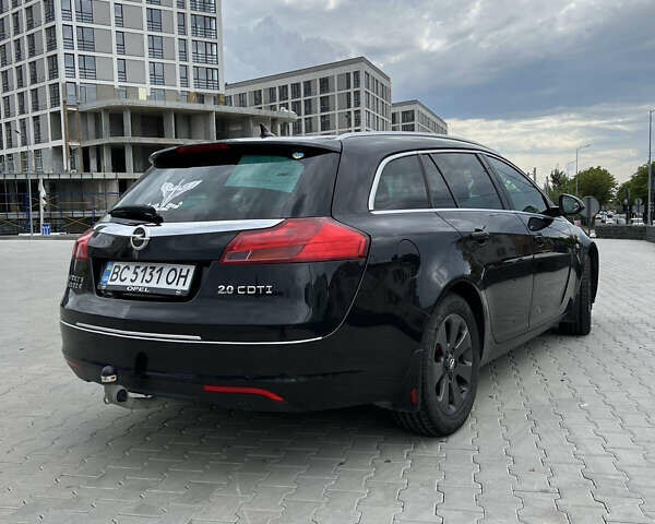 Черный Опель Инсигния, объемом двигателя 1.96 л и пробегом 230 тыс. км за 8500 $, фото 22 на Automoto.ua