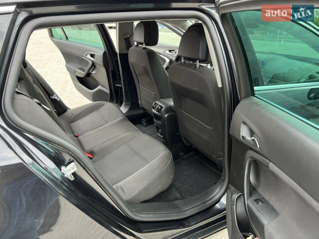 Черный Опель Инсигния, объемом двигателя 1.96 л и пробегом 230 тыс. км за 8500 $, фото 15 на Automoto.ua