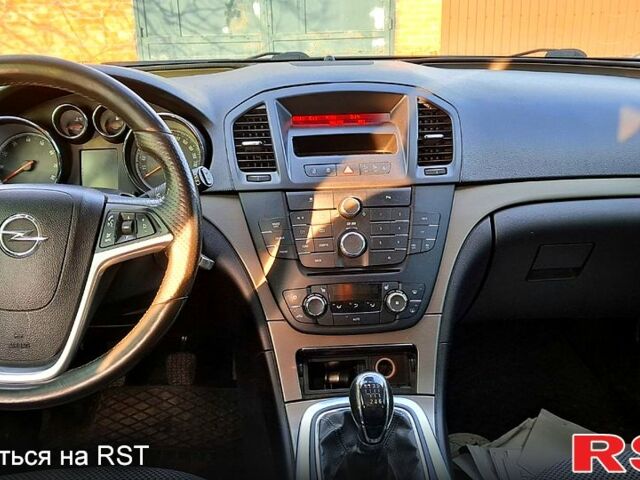Черный Опель Инсигния, объемом двигателя 1.8 л и пробегом 24000 тыс. км за 6500 $, фото 5 на Automoto.ua