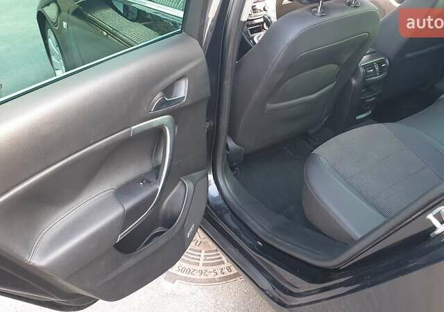 Черный Опель Инсигния, объемом двигателя 1.96 л и пробегом 315 тыс. км за 9000 $, фото 13 на Automoto.ua