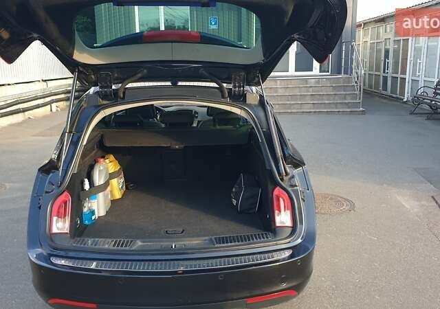 Черный Опель Инсигния, объемом двигателя 1.96 л и пробегом 315 тыс. км за 9000 $, фото 6 на Automoto.ua