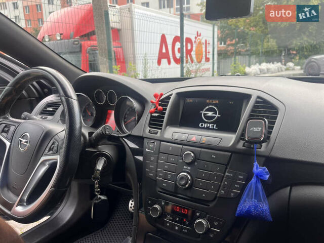 Черный Опель Инсигния, объемом двигателя 1.96 л и пробегом 300 тыс. км за 10400 $, фото 38 на Automoto.ua