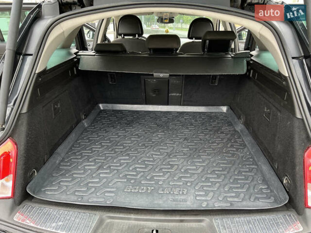 Черный Опель Инсигния, объемом двигателя 1.96 л и пробегом 230 тыс. км за 8500 $, фото 9 на Automoto.ua