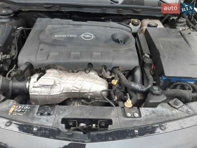 Чорний Опель Інсігнія, об'ємом двигуна 2 л та пробігом 214 тис. км за 12000 $, фото 5 на Automoto.ua