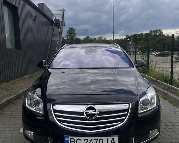 Черный Опель Инсигния, объемом двигателя 1.96 л и пробегом 300 тыс. км за 10400 $, фото 1 на Automoto.ua