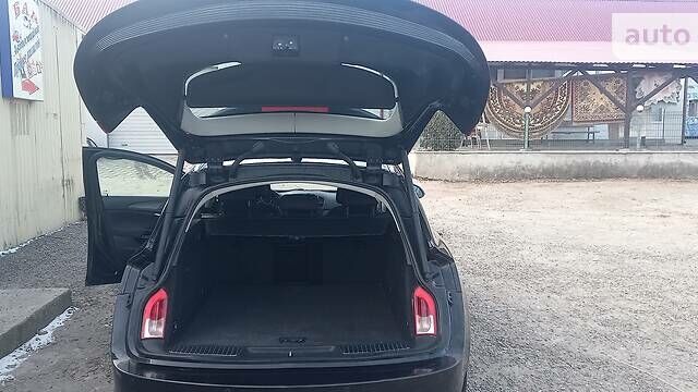 Черный Опель Инсигния, объемом двигателя 2 л и пробегом 400 тыс. км за 7500 $, фото 6 на Automoto.ua