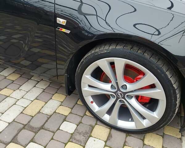 Черный Опель Инсигния, объемом двигателя 2 л и пробегом 199 тыс. км за 9700 $, фото 1 на Automoto.ua