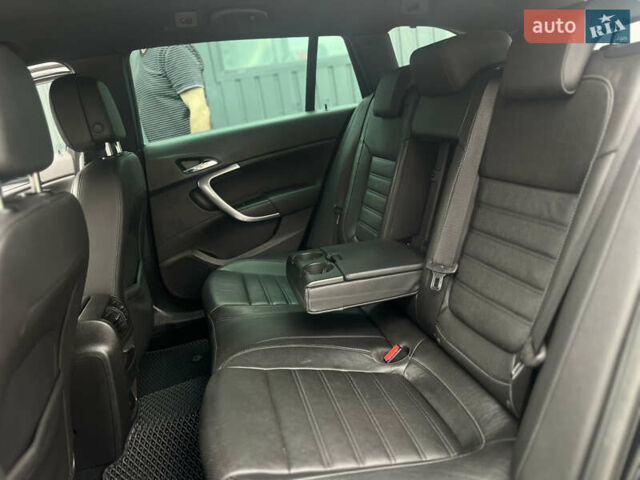 Черный Опель Инсигния, объемом двигателя 1.96 л и пробегом 300 тыс. км за 10400 $, фото 26 на Automoto.ua