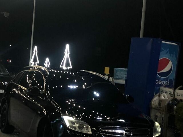 Черный Опель Инсигния, объемом двигателя 2 л и пробегом 360 тыс. км за 6300 $, фото 1 на Automoto.ua