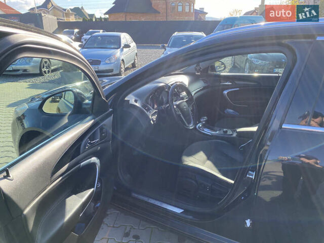 Черный Опель Инсигния, объемом двигателя 2 л и пробегом 288 тыс. км за 7600 $, фото 6 на Automoto.ua