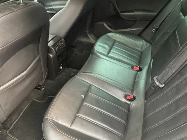 Чорний Опель Інсігнія, об'ємом двигуна 2 л та пробігом 333 тис. км за 10150 $, фото 6 на Automoto.ua