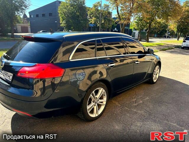 Черный Опель Инсигния, объемом двигателя 2 л и пробегом 29000 тыс. км за 7250 $, фото 4 на Automoto.ua