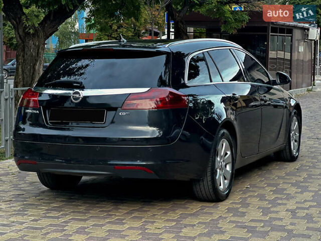 Опель Инсигния 2011 в Новоселица на Automoto.ua Черный Опель Инсигния, объемом двигателя 1.96 л и пробегом 378 тыс. км за 9200 $, фото 4 на Automoto.ua