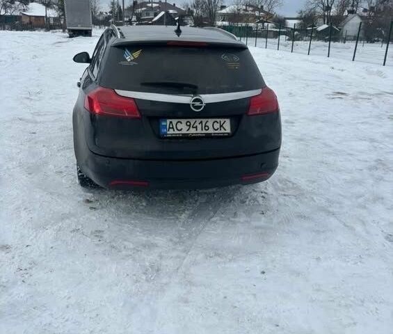 Чорний Опель Інсігнія, об'ємом двигуна 2 л та пробігом 245 тис. км за 8500 $, фото 14 на Automoto.ua