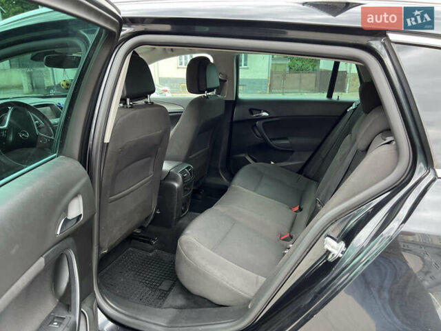 Черный Опель Инсигния, объемом двигателя 1.96 л и пробегом 230 тыс. км за 8500 $, фото 17 на Automoto.ua