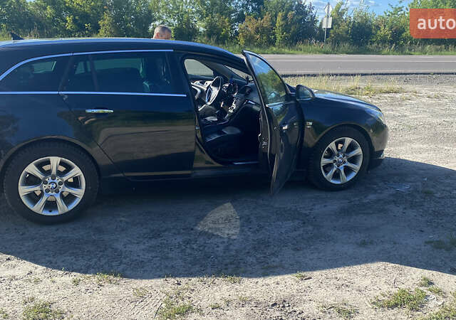 Черный Опель Инсигния, объемом двигателя 1.96 л и пробегом 260 тыс. км за 9900 $, фото 2 на Automoto.ua