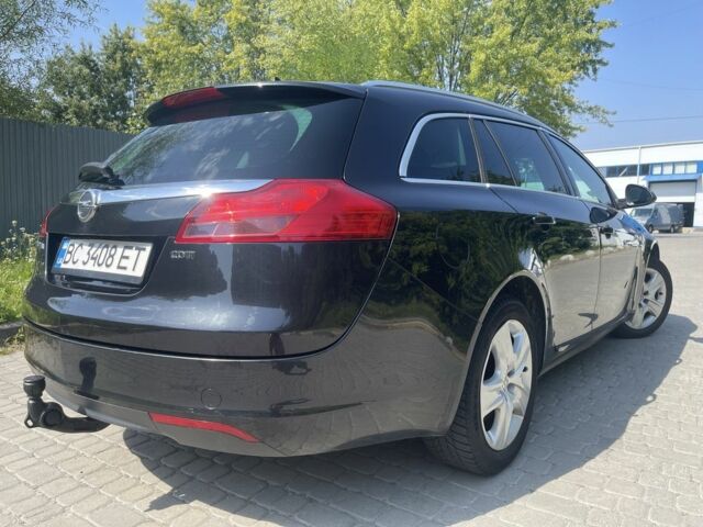 Чорний Опель Інсігнія, об'ємом двигуна 2 л та пробігом 340 тис. км за 6900 $, фото 2 на Automoto.ua