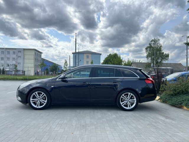 Черный Опель Инсигния, объемом двигателя 2 л и пробегом 345 тыс. км за 8500 $, фото 3 на Automoto.ua