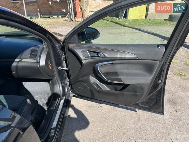 Черный Опель Инсигния, объемом двигателя 1.96 л и пробегом 232 тыс. км за 8000 $, фото 9 на Automoto.ua