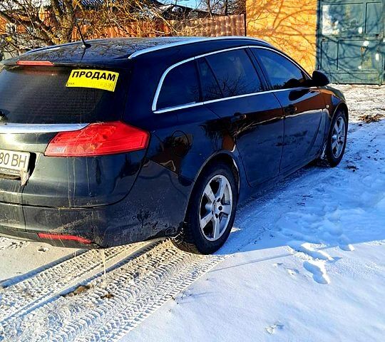 Черный Опель Инсигния, объемом двигателя 1.8 л и пробегом 24000 тыс. км за 6500 $, фото 3 на Automoto.ua
