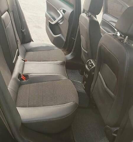 Черный Опель Инсигния, объемом двигателя 1.96 л и пробегом 298 тыс. км за 10000 $, фото 6 на Automoto.ua