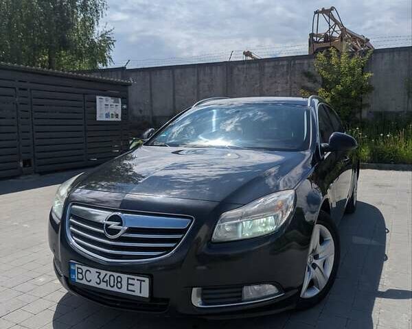 Черный Опель Инсигния, объемом двигателя 1.96 л и пробегом 339 тыс. км за 7700 $, фото 6 на Automoto.ua