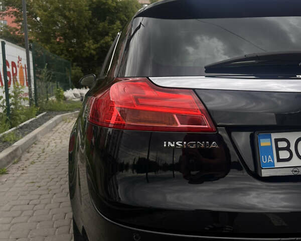 Черный Опель Инсигния, объемом двигателя 1.96 л и пробегом 300 тыс. км за 10400 $, фото 15 на Automoto.ua