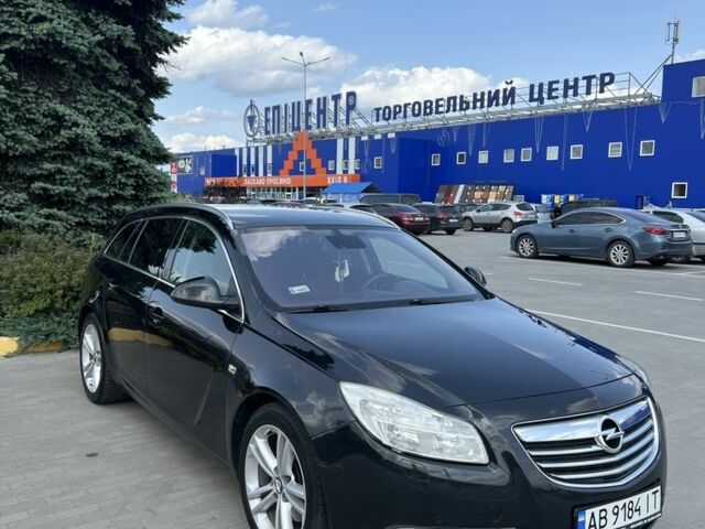Черный Опель Инсигния, объемом двигателя 2 л и пробегом 345 тыс. км за 8500 $, фото 1 на Automoto.ua
