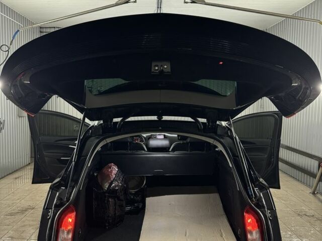 Черный Опель Инсигния, объемом двигателя 2 л и пробегом 280 тыс. км за 5700 $, фото 8 на Automoto.ua