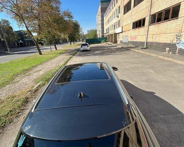 Чорний Опель Інсігнія, об'ємом двигуна 1.96 л та пробігом 295 тис. км за 8900 $, фото 7 на Automoto.ua