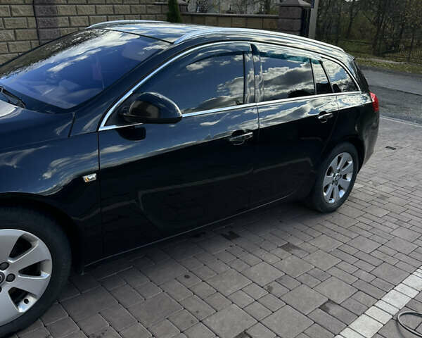 Опель Инсигния 2011 в Тернополе на Automoto.ua Черный Опель Инсигния, объемом двигателя 1.96 л и пробегом 350 тыс. км за 6750 $, фото 15 на Automoto.ua