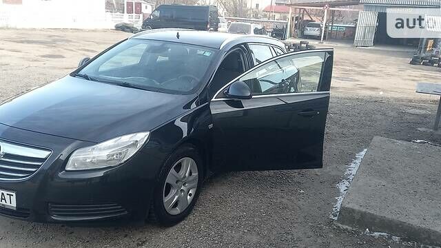 Черный Опель Инсигния, объемом двигателя 2 л и пробегом 400 тыс. км за 7500 $, фото 7 на Automoto.ua