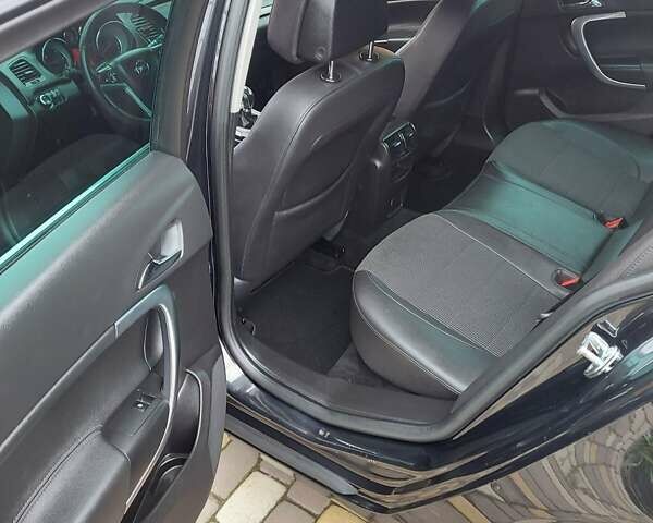 Черный Опель Инсигния, объемом двигателя 2 л и пробегом 199 тыс. км за 9700 $, фото 29 на Automoto.ua