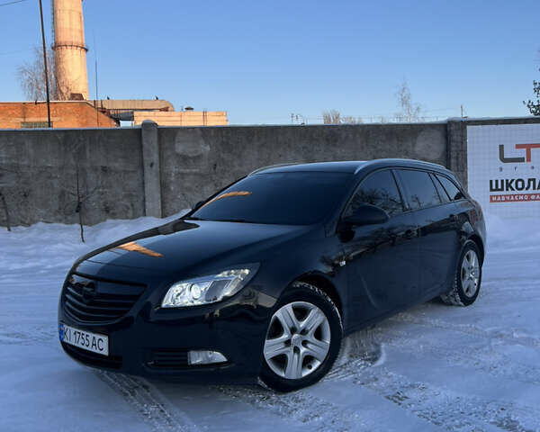 Чорний Опель Інсігнія, об'ємом двигуна 1.96 л та пробігом 232 тис. км за 8600 $, фото 1 на Automoto.ua