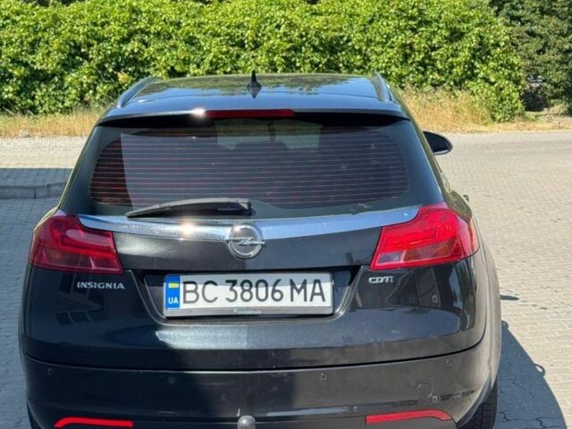 Чорний Опель Інсігнія, об'ємом двигуна 2 л та пробігом 320 тис. км за 6900 $, фото 4 на Automoto.ua