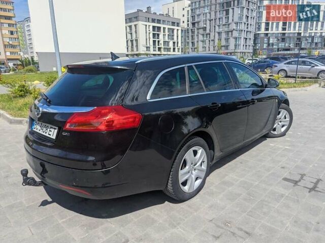 Черный Опель Инсигния, объемом двигателя 1.96 л и пробегом 339 тыс. км за 7700 $, фото 1 на Automoto.ua