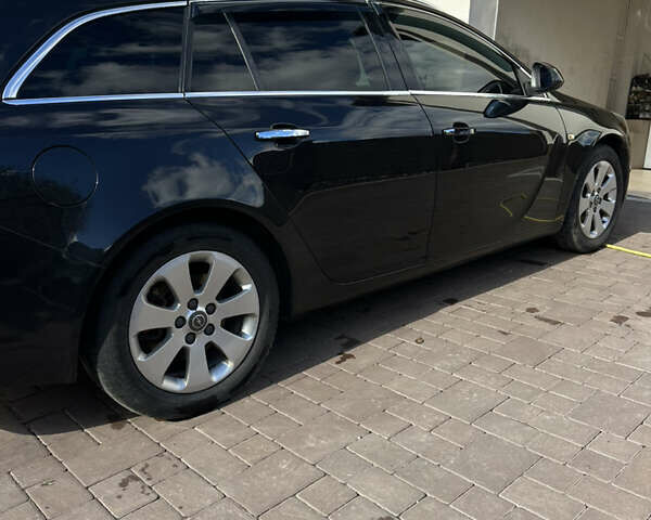 Опель Инсигния 2011 в Тернополе на Automoto.ua Черный Опель Инсигния, объемом двигателя 1.96 л и пробегом 350 тыс. км за 6750 $, фото 7 на Automoto.ua