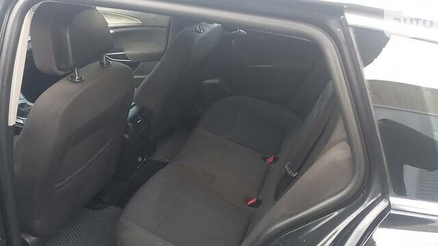 Черный Опель Инсигния, объемом двигателя 2 л и пробегом 400 тыс. км за 7500 $, фото 4 на Automoto.ua