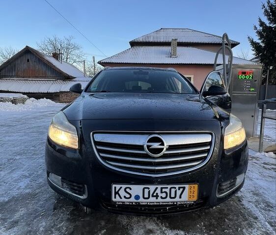 Чорний Опель Інсігнія, об'ємом двигуна 2 л та пробігом 273 тис. км за 3775 $, фото 1 на Automoto.ua