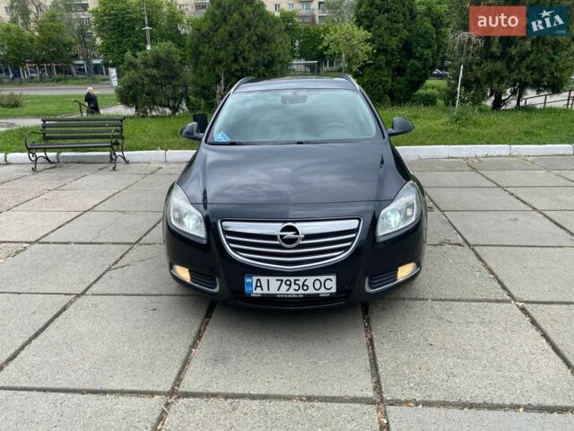 Черный Опель Инсигния, объемом двигателя 2 л и пробегом 303 тыс. км за 7400 $, фото 1 на Automoto.ua