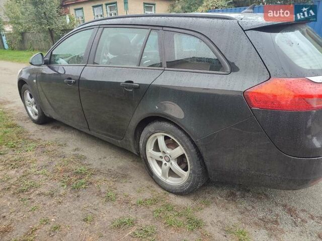 Черный Опель Инсигния, объемом двигателя 1.96 л и пробегом 222 тыс. км за 7600 $, фото 1 на Automoto.ua