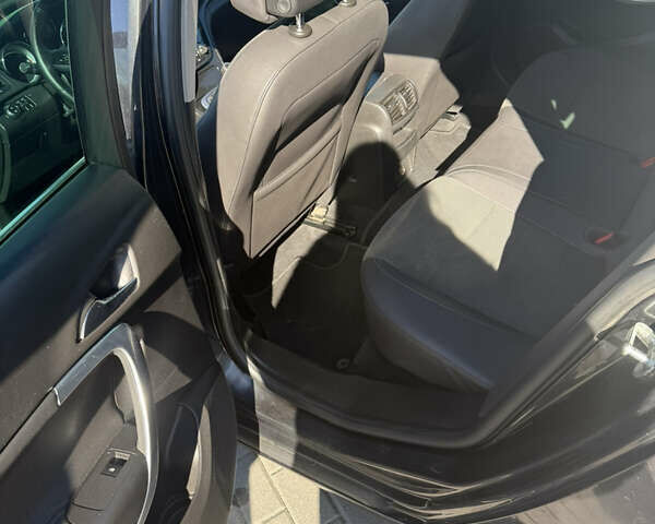 Черный Опель Инсигния, объемом двигателя 1.96 л и пробегом 394 тыс. км за 6000 $, фото 7 на Automoto.ua