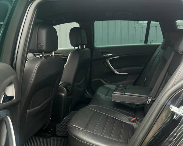 Черный Опель Инсигния, объемом двигателя 1.96 л и пробегом 300 тыс. км за 10400 $, фото 25 на Automoto.ua