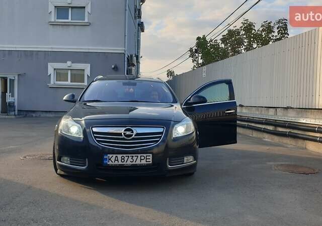 Черный Опель Инсигния, объемом двигателя 1.96 л и пробегом 315 тыс. км за 9000 $, фото 3 на Automoto.ua