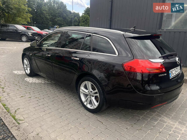 Черный Опель Инсигния, объемом двигателя 1.96 л и пробегом 300 тыс. км за 10400 $, фото 6 на Automoto.ua