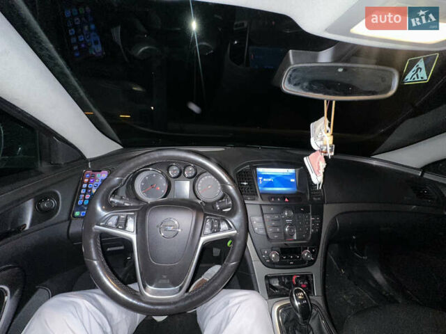 Чорний Опель Інсігнія, об'ємом двигуна 1.96 л та пробігом 215 тис. км за 7777 $, фото 2 на Automoto.ua