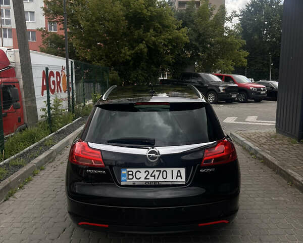 Черный Опель Инсигния, объемом двигателя 1.96 л и пробегом 300 тыс. км за 10400 $, фото 16 на Automoto.ua