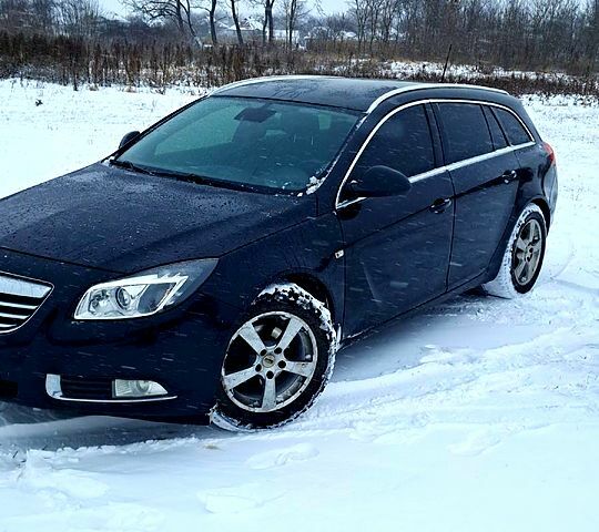 Черный Опель Инсигния, объемом двигателя 1.8 л и пробегом 24000 тыс. км за 6500 $, фото 1 на Automoto.ua